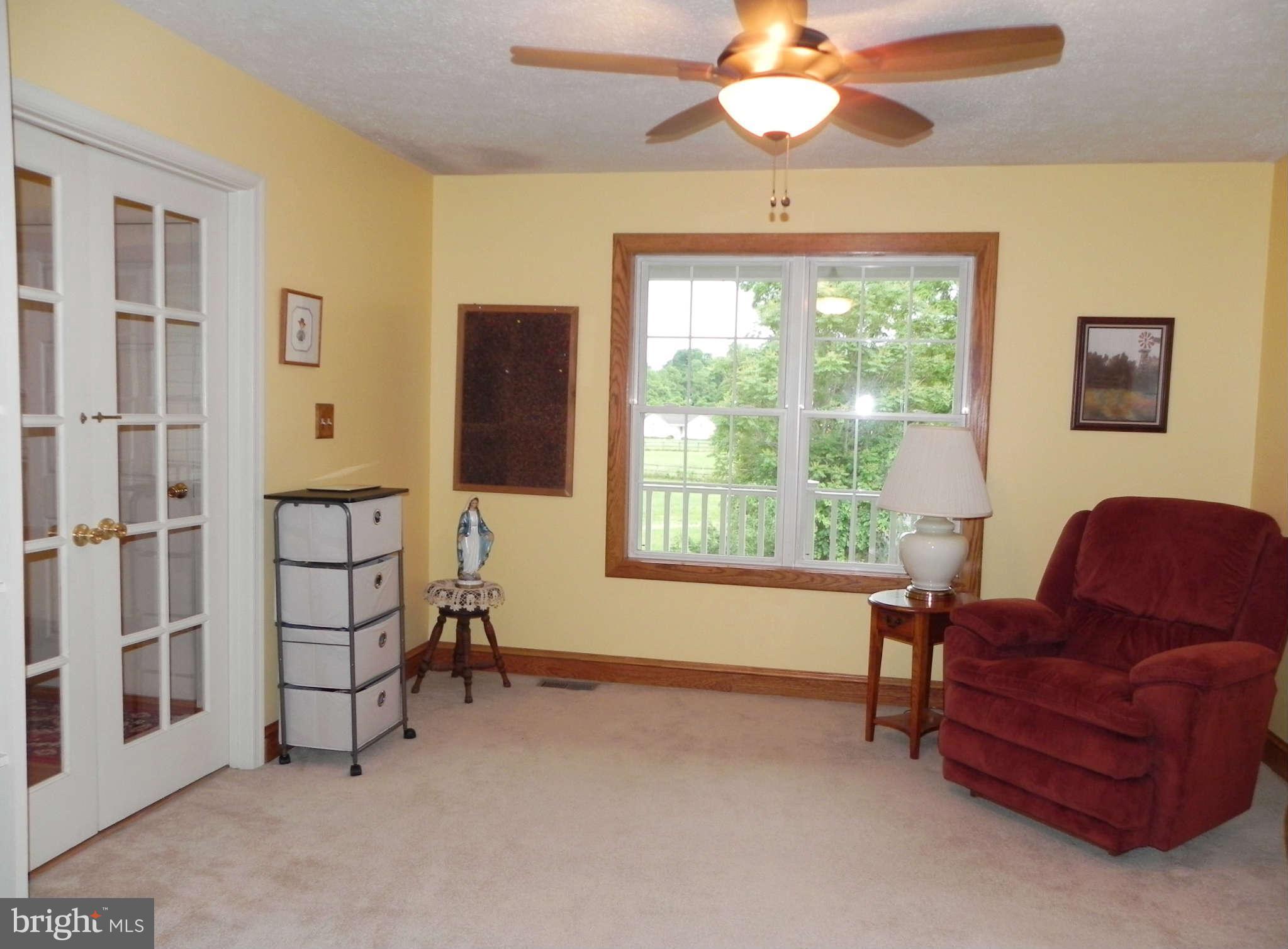 303 Stony Lane Ranson, WV 25438 - Photo 9 of 30 Dining Room w/ Built-In Shelving & French Doors