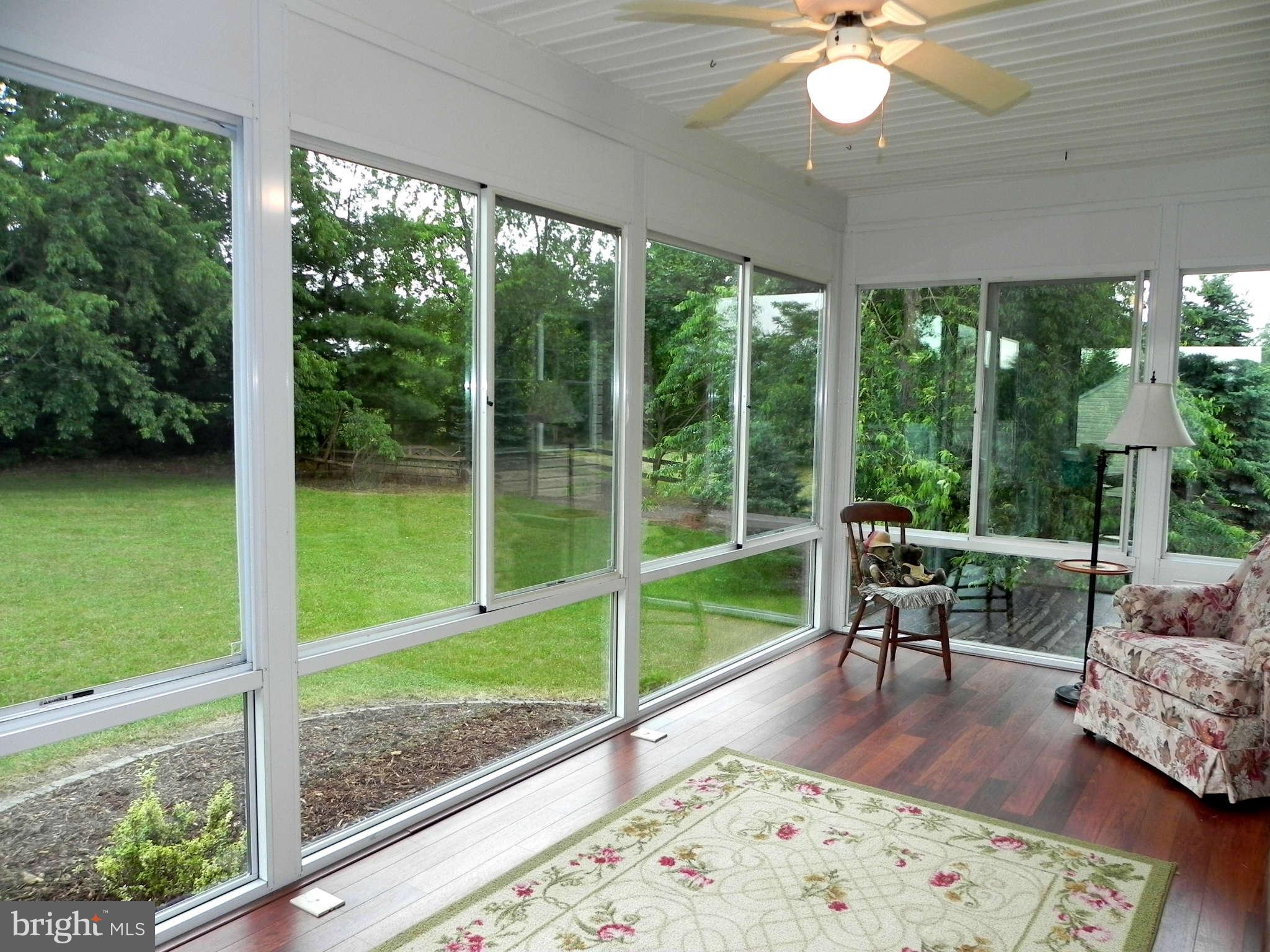 303 Stony Lane Ranson, WV 25438 - Photo 10 of 30 Rear Sun Room