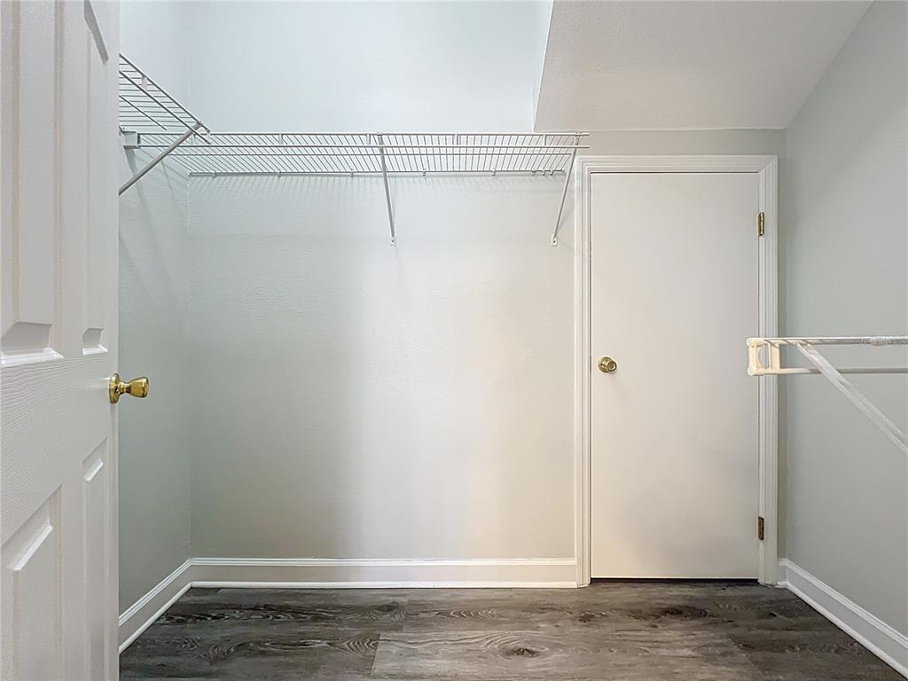 16178 Old Ash Loop Orlando, FL 32828 - Photo 26 of 58 a view of a room with racks on the wall