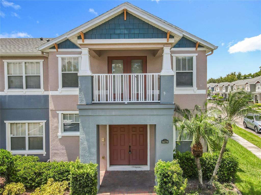 16178 Old Ash Loop Orlando, FL 32828 - Photo 3 of 58 front view of a house with a yard