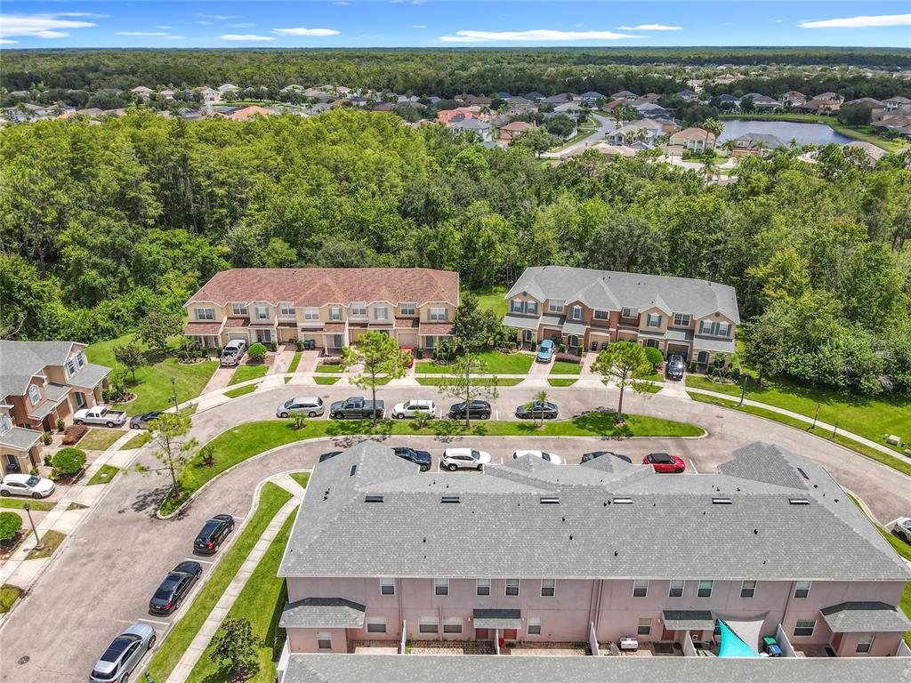 16178 Old Ash Loop Orlando, FL 32828 - Photo 56 of 58 an aerial view of residential houses with outdoor space and swimming pool