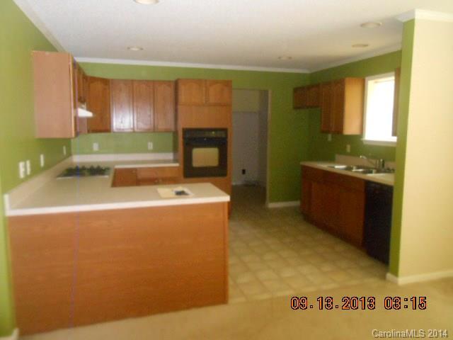 6226 Jesse Rushing Road Marshville, NC 28103 - Photo 2 of 10 a room with a sink and cabinets