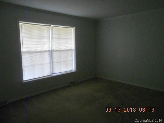 6226 Jesse Rushing Road Marshville, NC 28103 - Photo 4 of 10 an empty room with a window