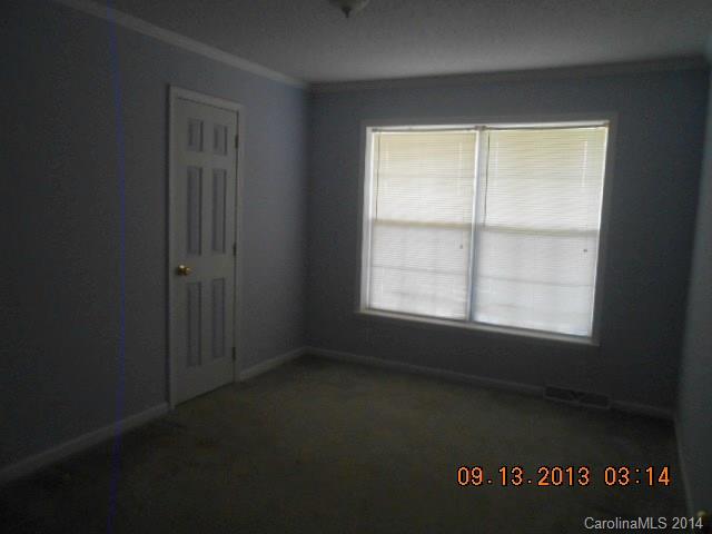6226 Jesse Rushing Road Marshville, NC 28103 - Photo 5 of 10 an empty room with a window