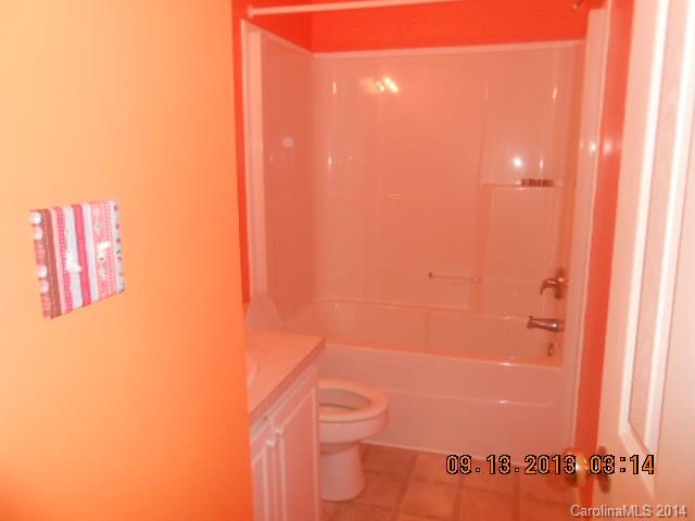 6226 Jesse Rushing Road Marshville, NC 28103 - Photo 8 of 10 a bathroom with a shower and a toilet