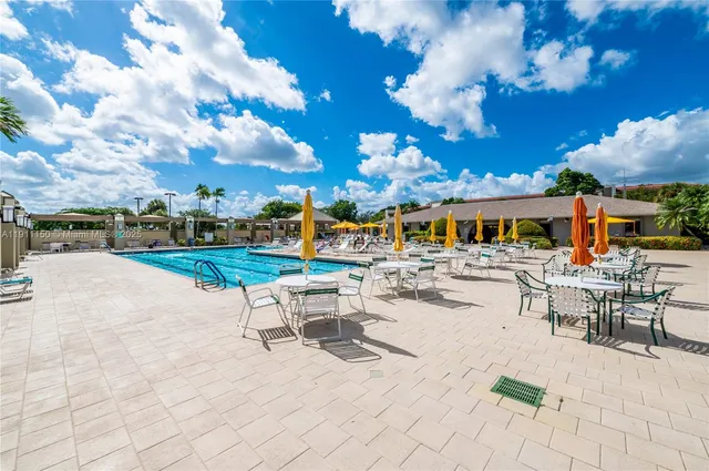a view of a terrace with sitting area