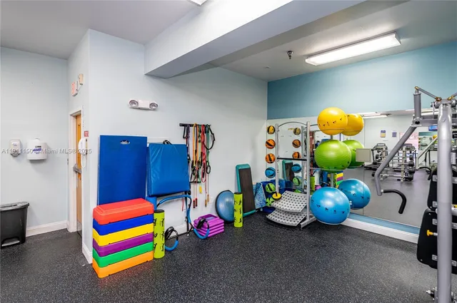 a view of a room with gym equipment