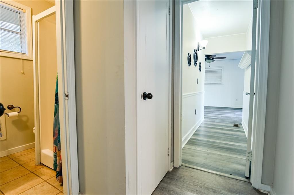 458 Haley Road Jackson, GA 30233 - Photo 17 of 47 a view of a hallway with a door and stairs