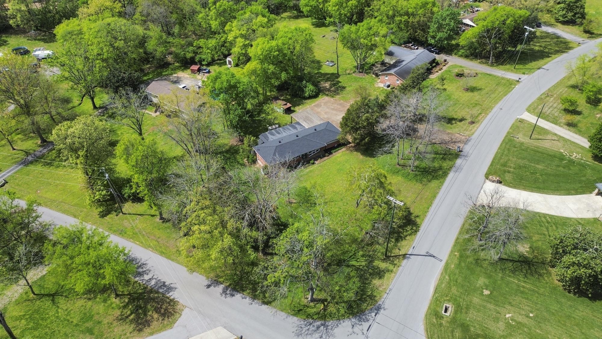 127 Riviera Drive Hendersonville, TN 37075 - Photo 13 of 46 an aerial view of residential houses with outdoor space and trees all around
