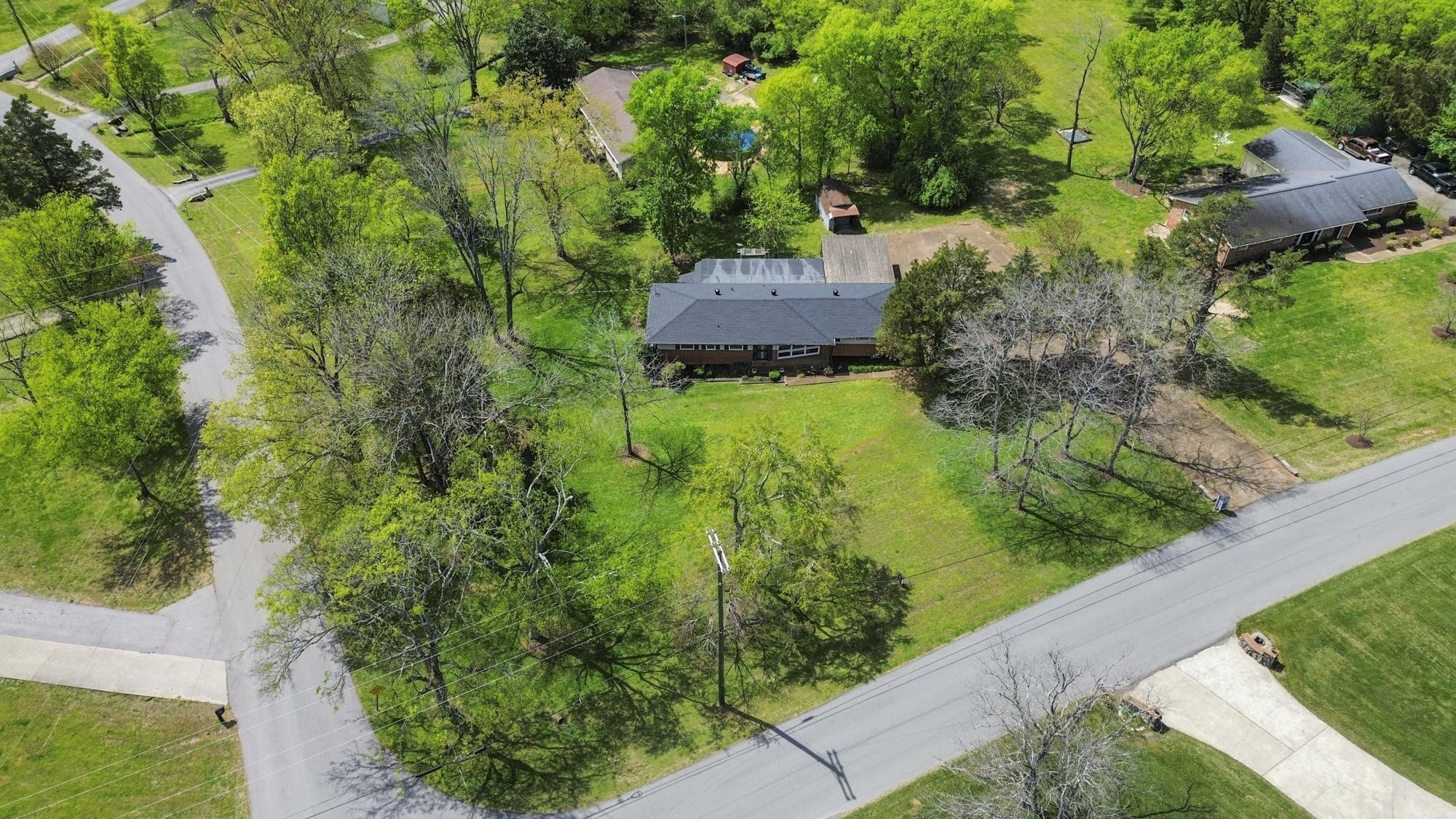 127 Riviera Drive Hendersonville, TN 37075 - Photo 14 of 46 an aerial view of residential house with outdoor space and trees all around
