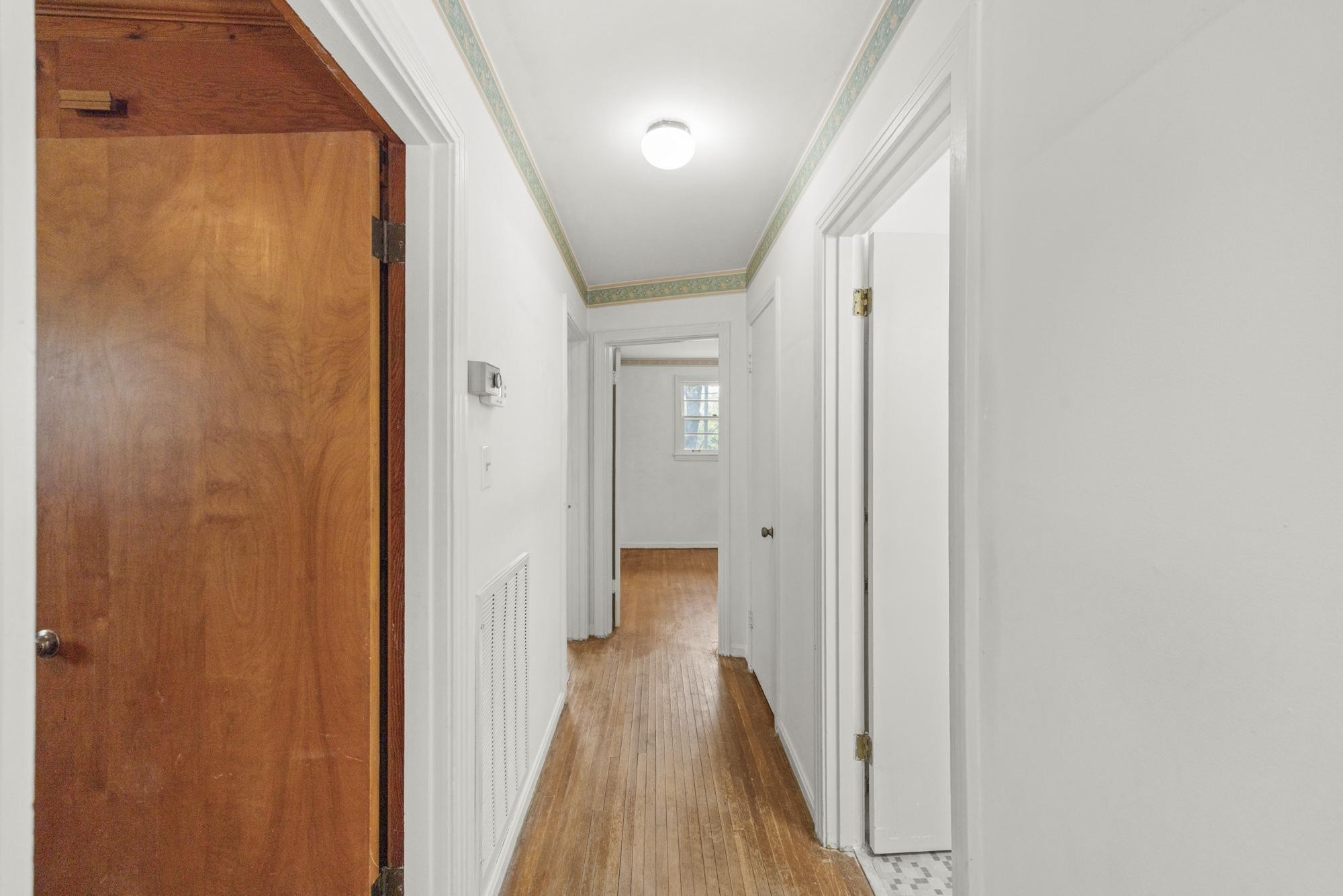 127 Riviera Drive Hendersonville, TN 37075 - Photo 35 of 46 a view of a hallway with wooden floor and staircase