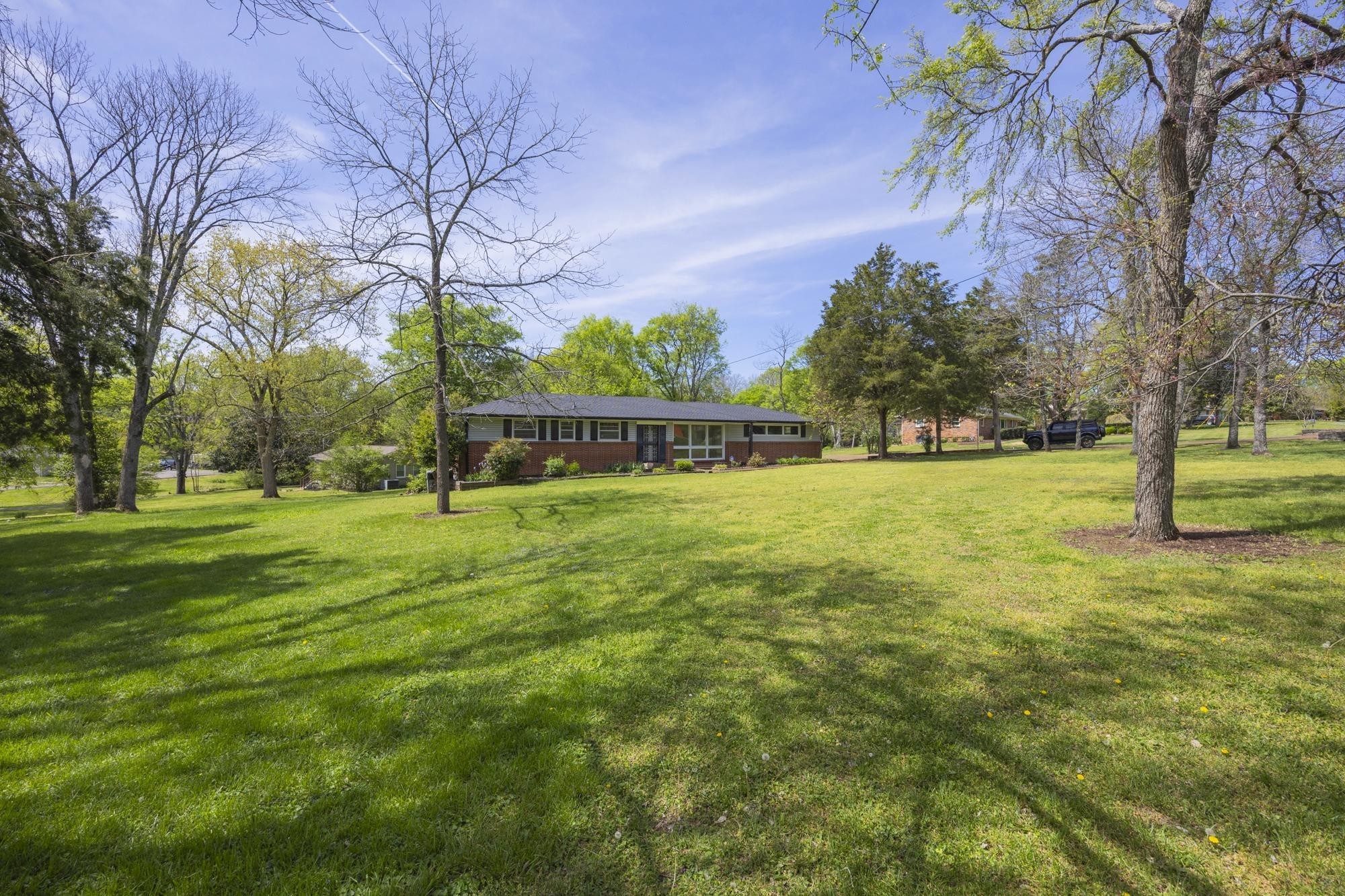 127 Riviera Drive Hendersonville, TN 37075 - Photo 5 of 46 a view of a park with large trees