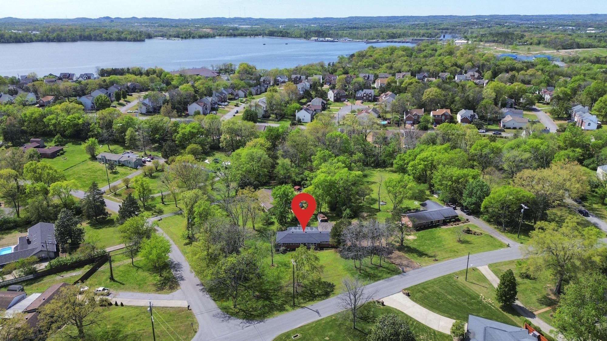 127 Riviera Drive Hendersonville, TN 37075 - Photo 10 of 46 an aerial view of a house with a garden and lake view