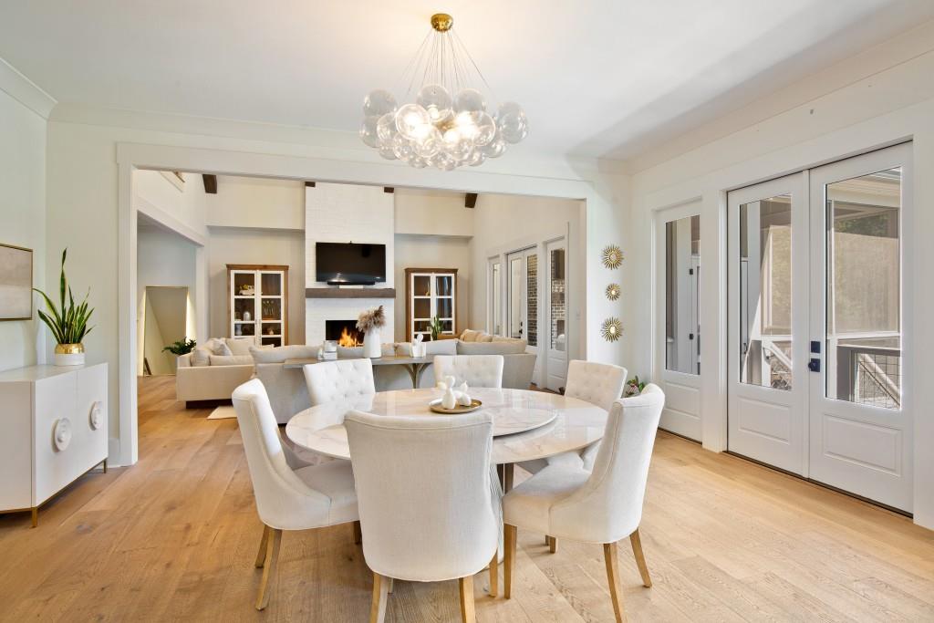 13235 Arnold Mill Road Roswell, GA 30075 - Photo 13 of 72 a view of a dining room with furniture a chandelier and wooden floor