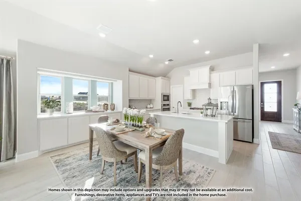a living room with furniture a large window and wooden floor