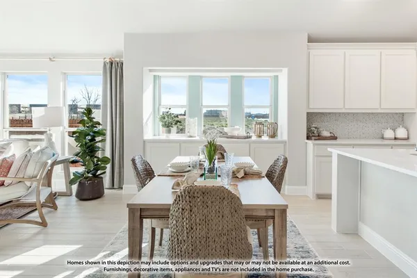 a kitchen with stainless steel appliances a refrigerator sink and cabinets