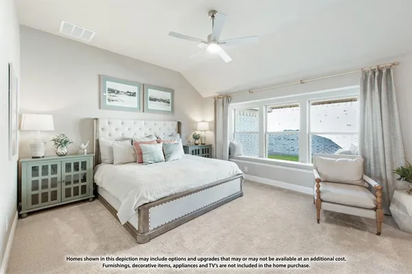 a living room with furniture a ceiling fan and a rug