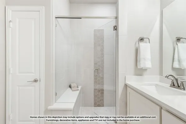 a bathroom with a tub a toilet and a sink