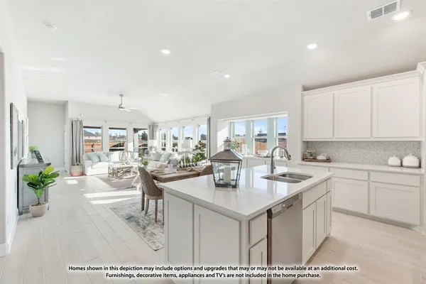a kitchen with a sink and chairs