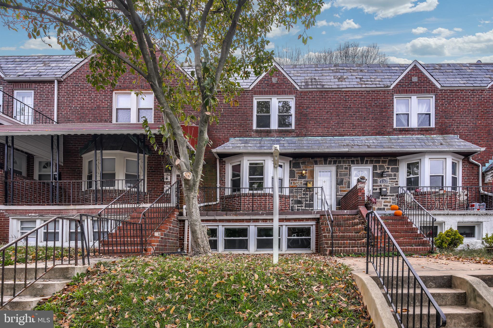 134 Cherrydell Road Baltimore, MD 21228 - Photo 2 of 36 a front view of a house with balcony