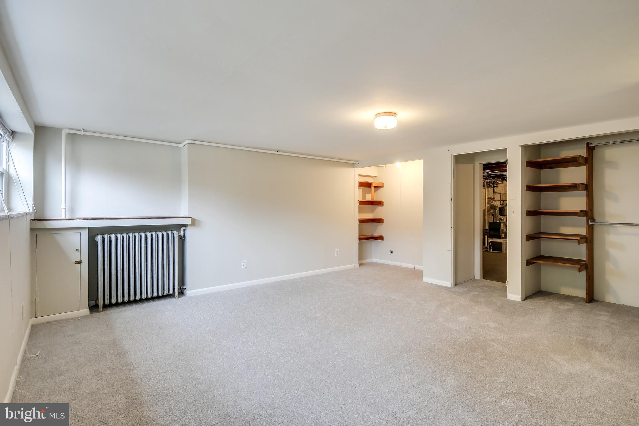 134 Cherrydell Road Baltimore, MD 21228 - Photo 16 of 36 a view of an empty room with a window