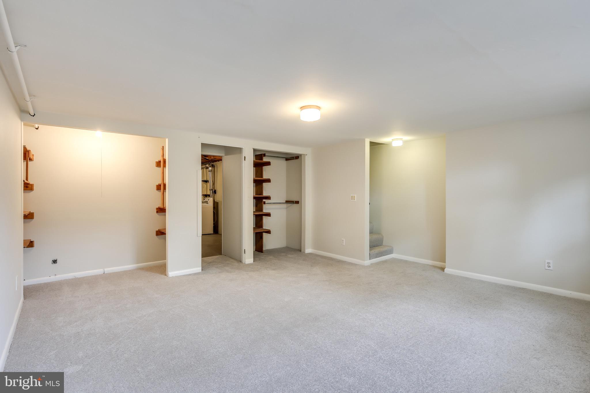 134 Cherrydell Road Baltimore, MD 21228 - Photo 17 of 36 an empty room with closet and natural light