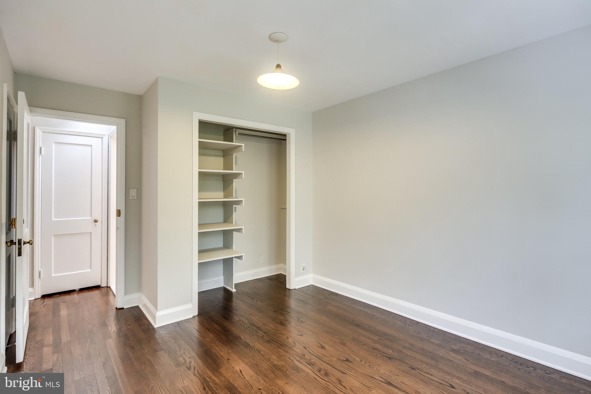 134 Cherrydell Road Baltimore, MD 21228 - Photo 24 of 36 a view of wooden floor and windows in a room
