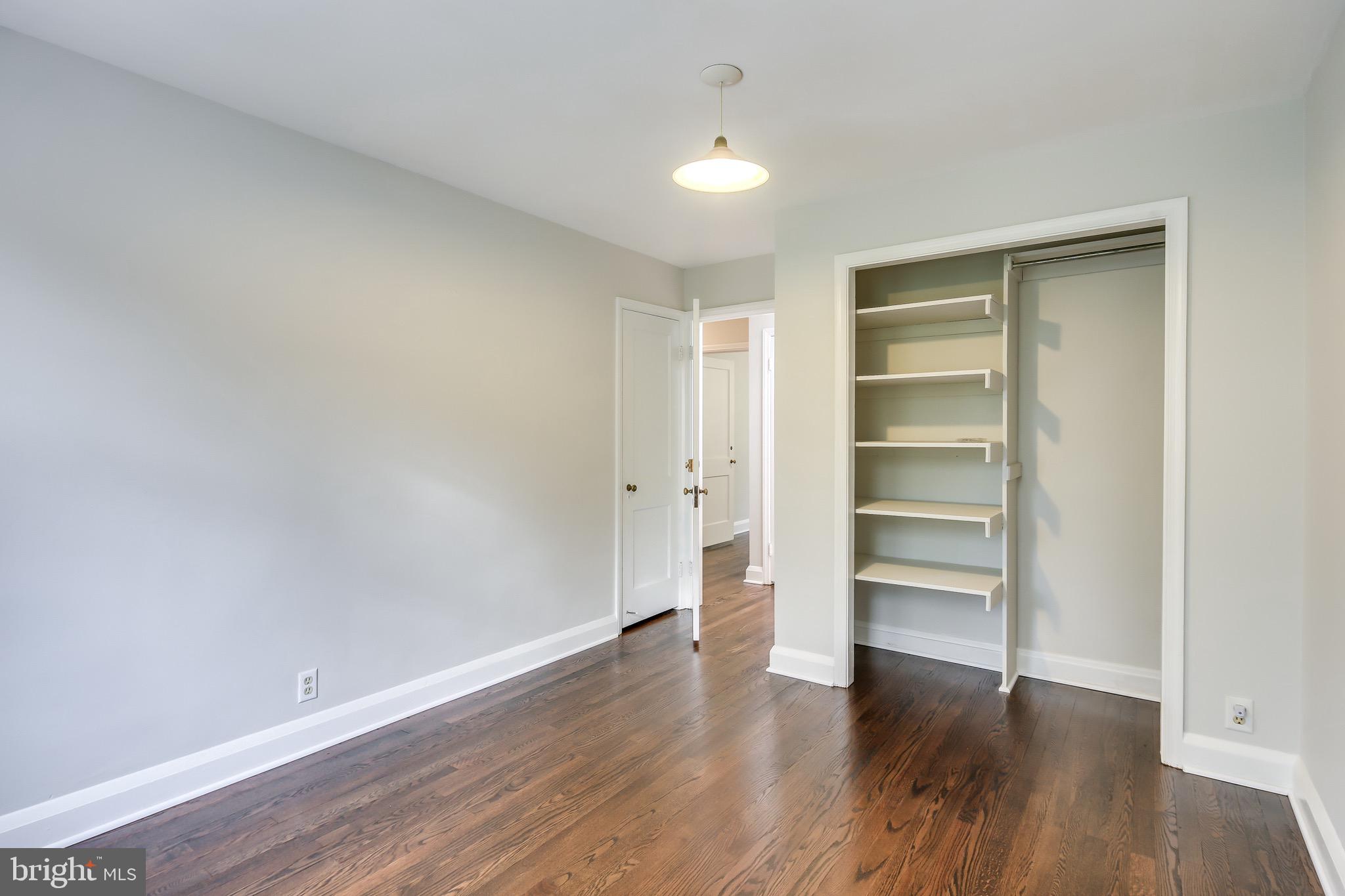 134 Cherrydell Road Baltimore, MD 21228 - Photo 27 of 36 a view of walk in closet with empty racks