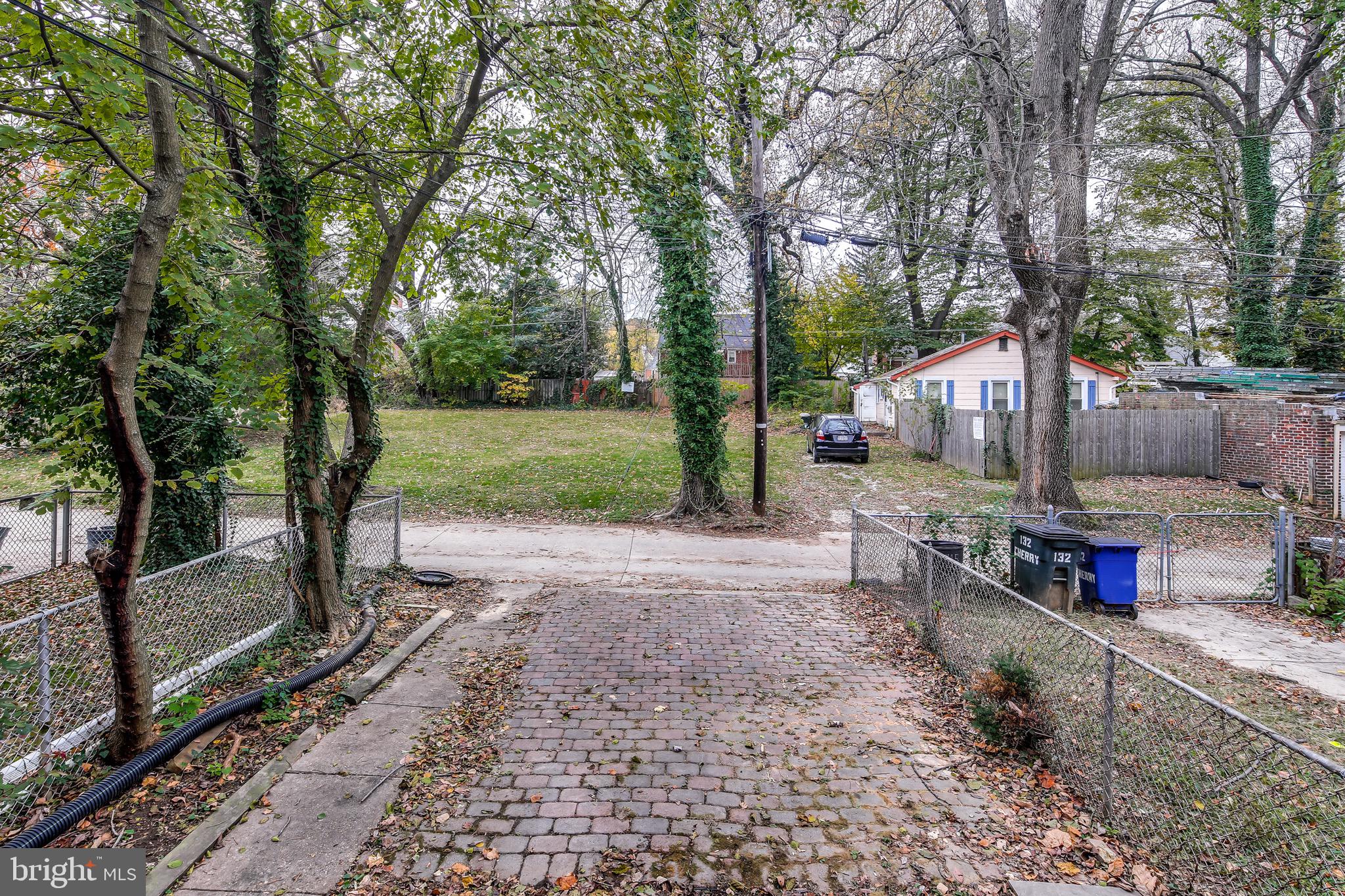 134 Cherrydell Road Baltimore, MD 21228 - Photo 35 of 36 a view of a yard with a tree