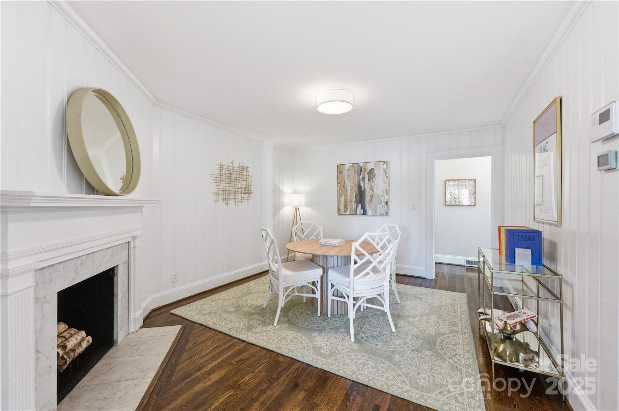 1305 Lilac Road Charlotte, NC 28209 - Photo 17 of 48 a view of a livingroom with furniture and a fireplace