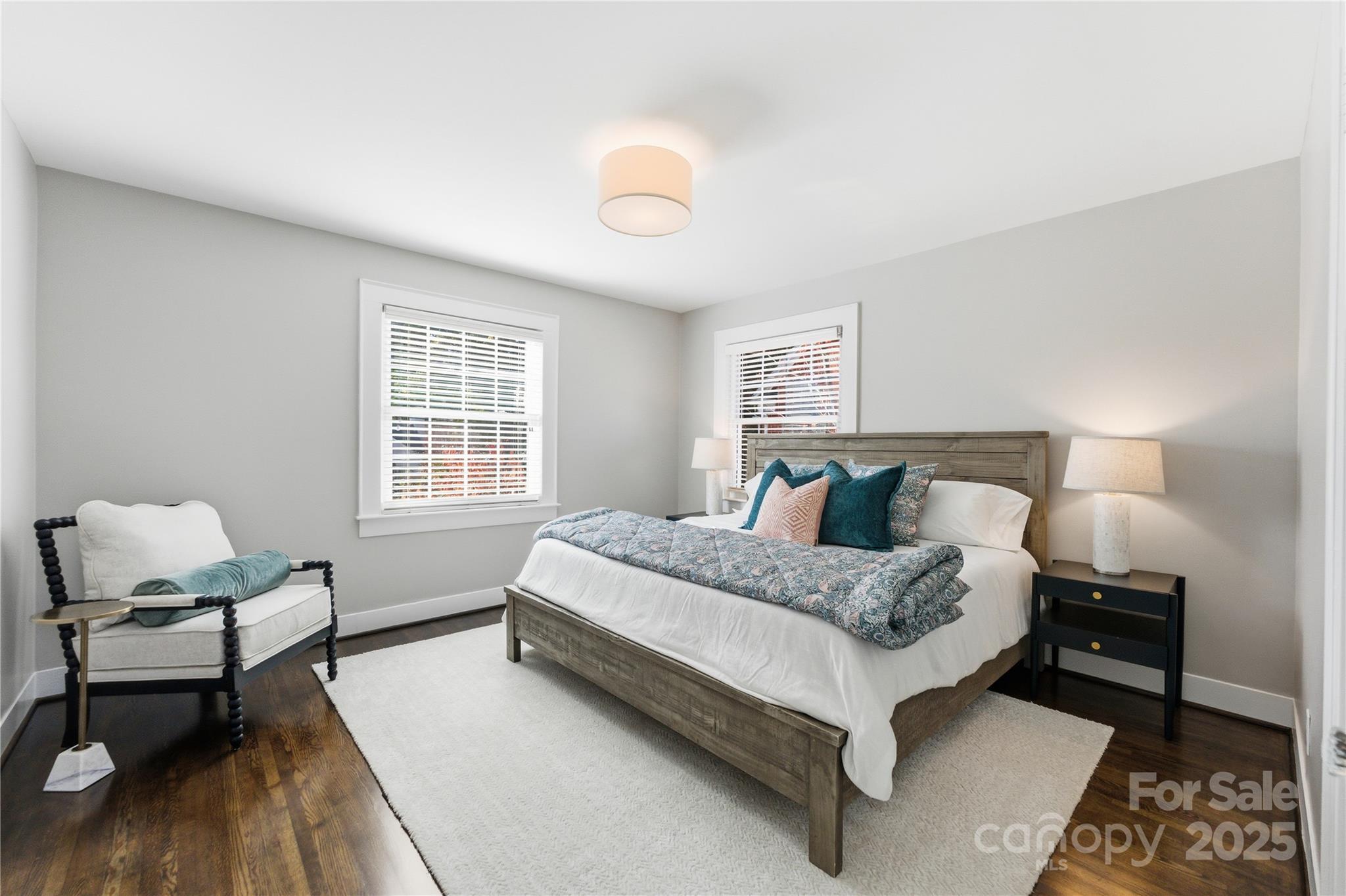 1305 Lilac Road Charlotte, NC 28209 - Photo 27 of 48 a spacious bedroom with a bed and a window