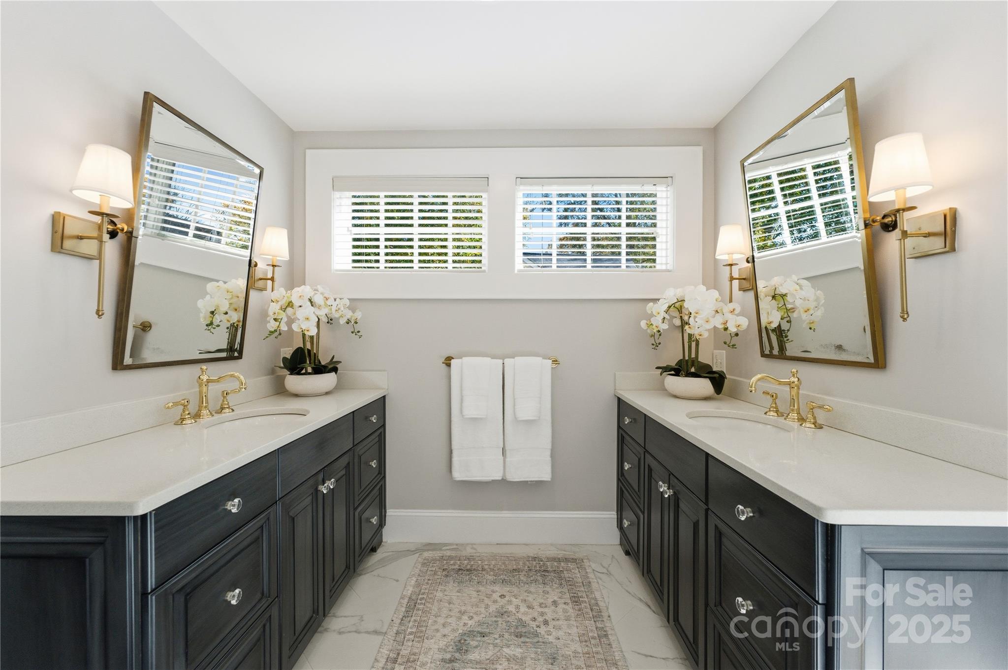 1305 Lilac Road Charlotte, NC 28209 - Photo 32 of 48 a spacious bathroom with double vanity and a mirror