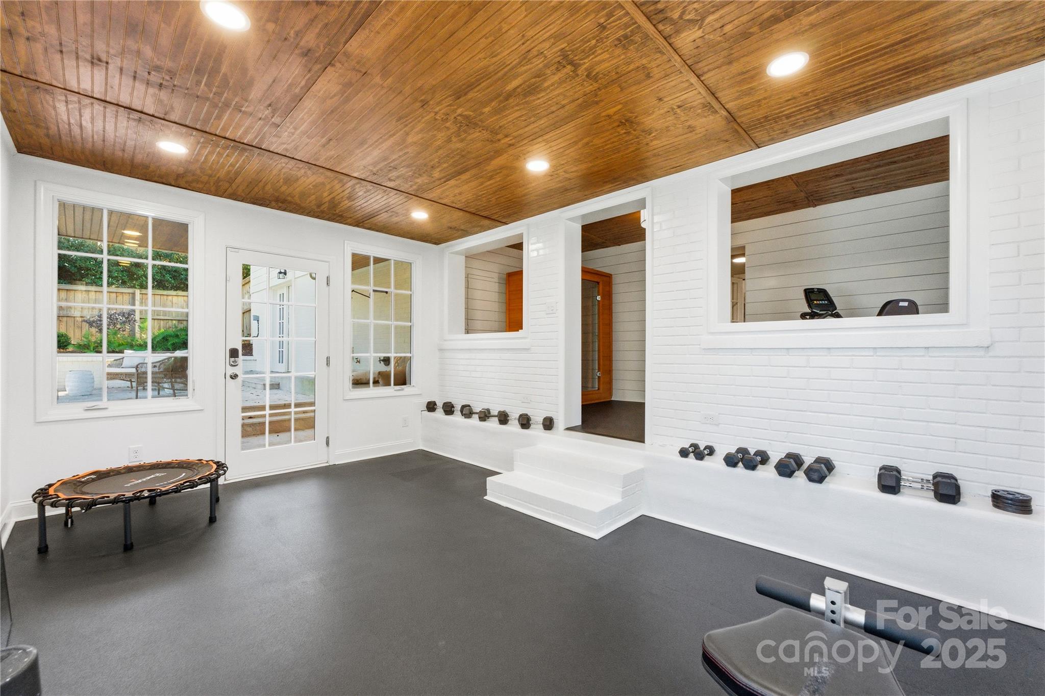 1305 Lilac Road Charlotte, NC 28209 - Photo 41 of 48 a living room with furniture and window