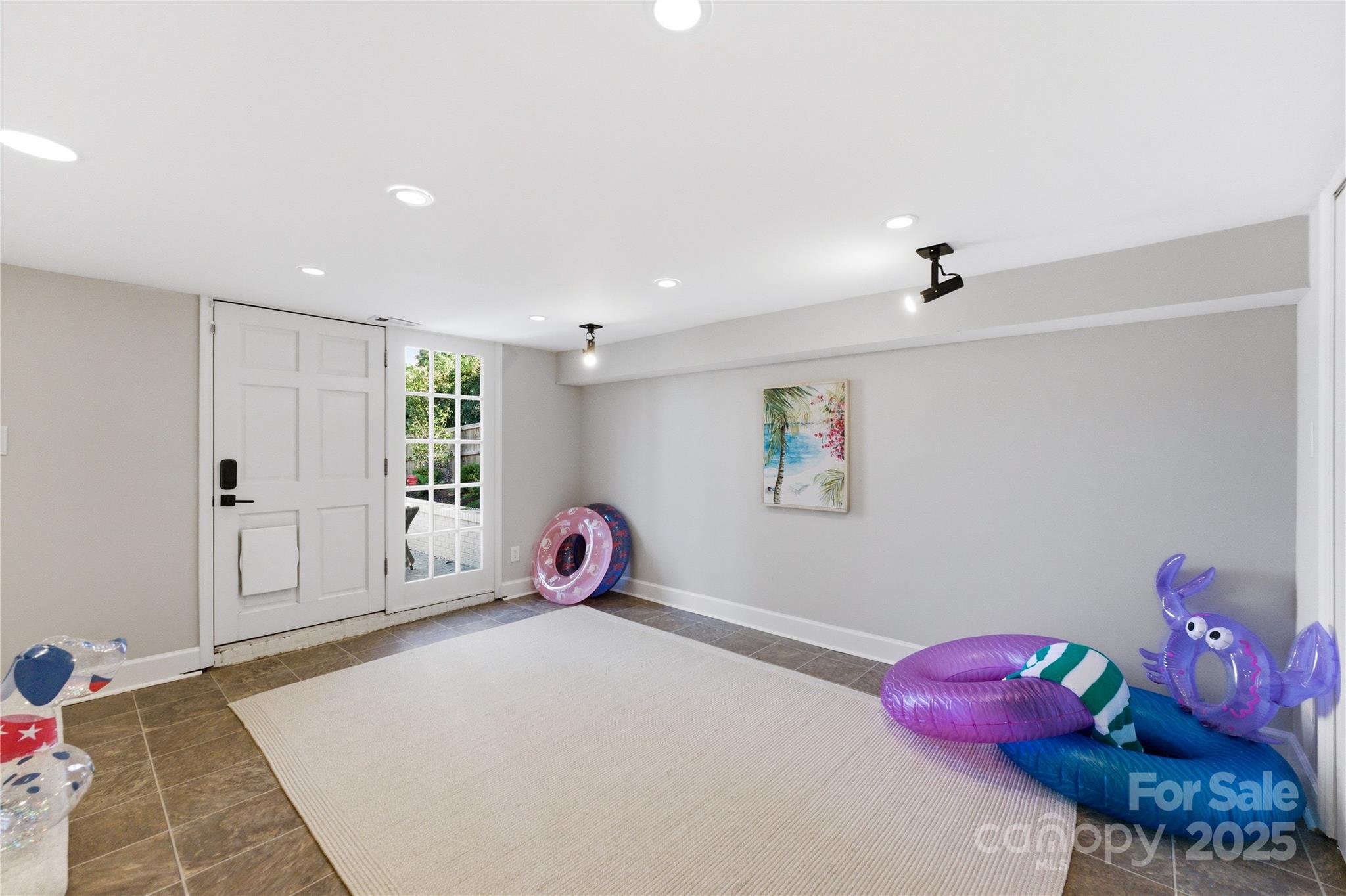 1305 Lilac Road Charlotte, NC 28209 - Photo 44 of 48 a bed room with a bed and a window