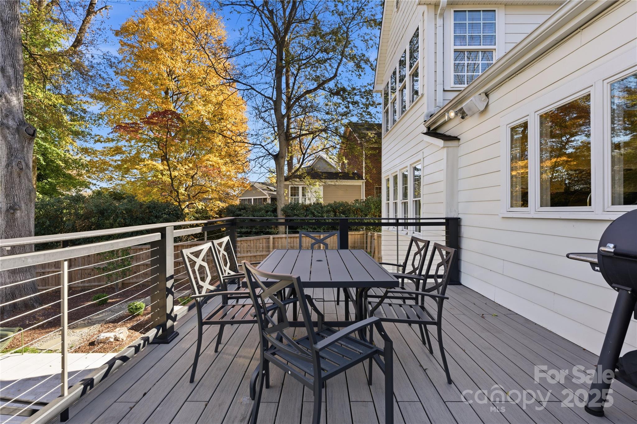 1305 Lilac Road Charlotte, NC 28209 - Photo 46 of 48 a view of a chairs on the roof deck