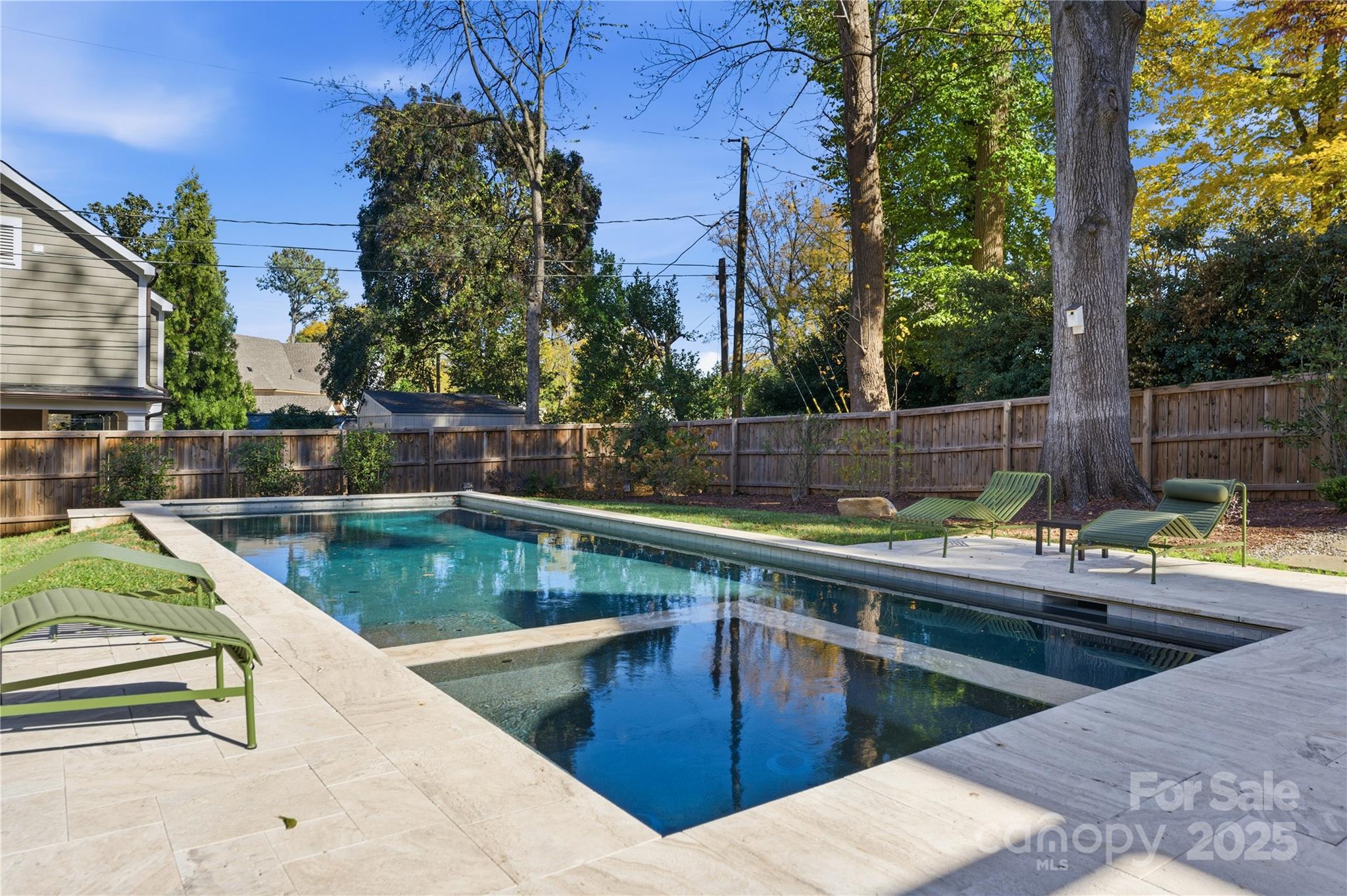 1305 Lilac Road Charlotte, NC 28209 - Photo 47 of 48 a view of a swimming pool with a patio