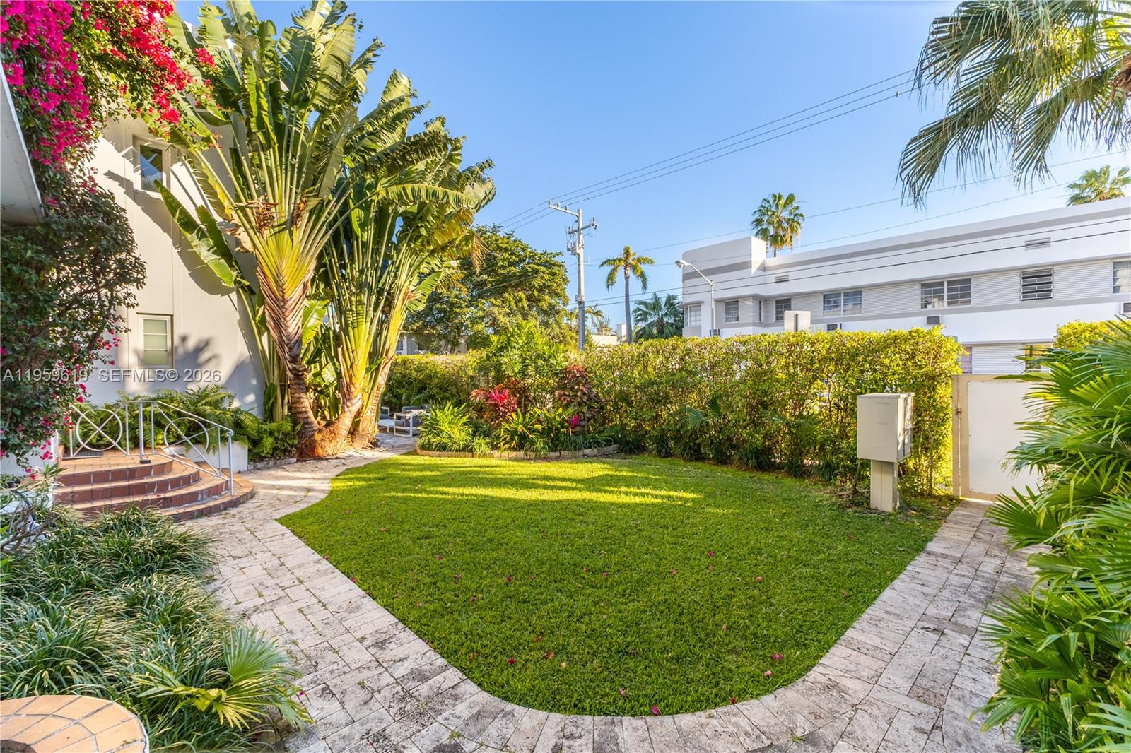 711 14th Street, Unit 4 Miami Beach, FL 33139 - Photo 17 of 27 a view of a house with a backyard