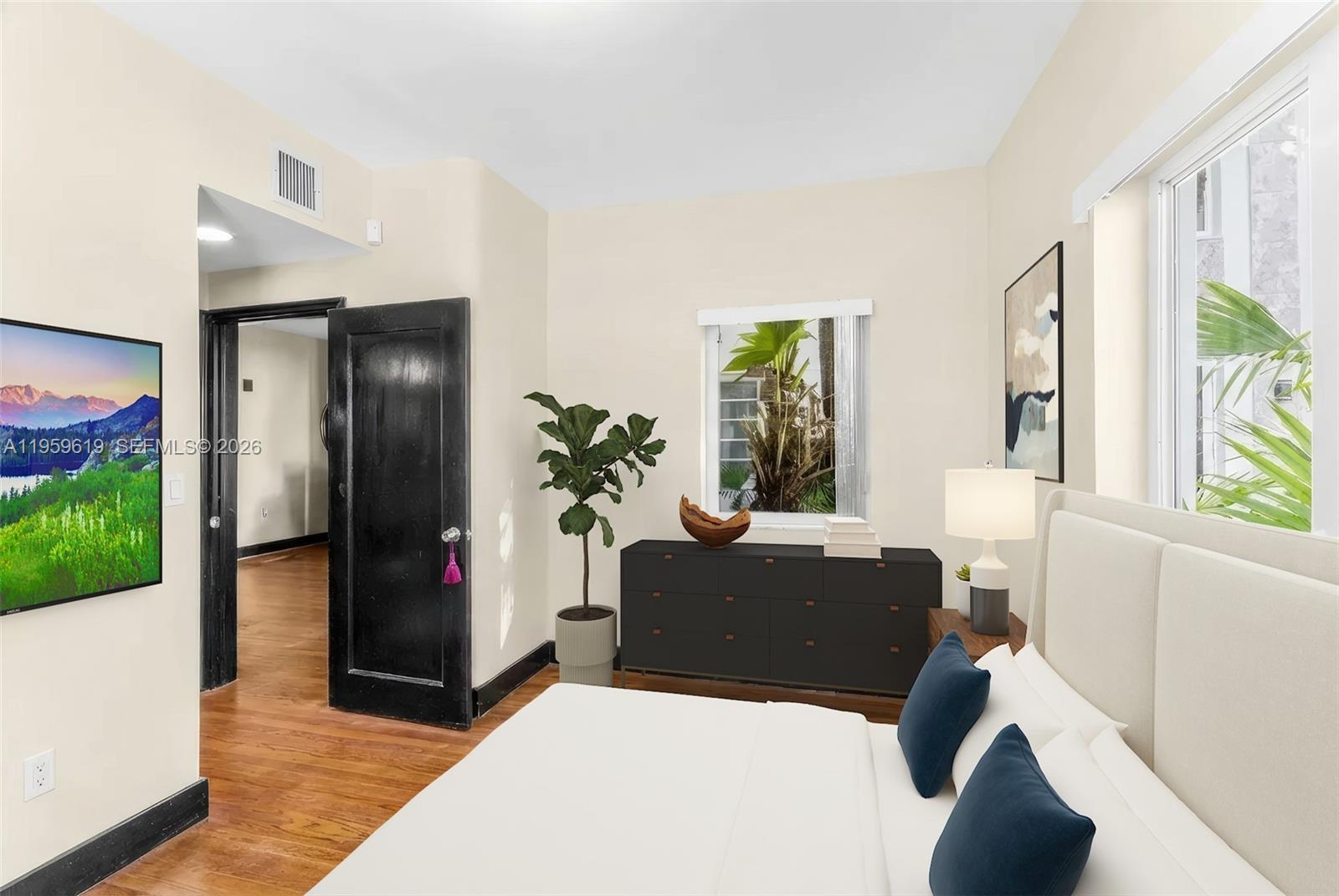 711 14th Street, Unit 4 Miami Beach, FL 33139 - Photo 8 of 27 a living room with furniture and a gate