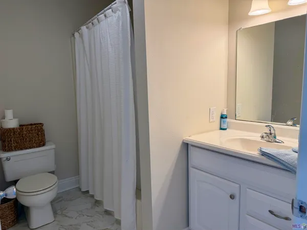 $229,500 | 411 Admiral Craik Drive, Unit 3, Grand Isle, LA 70358