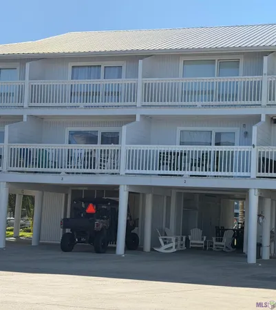$229,500 | 411 Admiral Craik Drive, Unit 3, Grand Isle, LA 70358