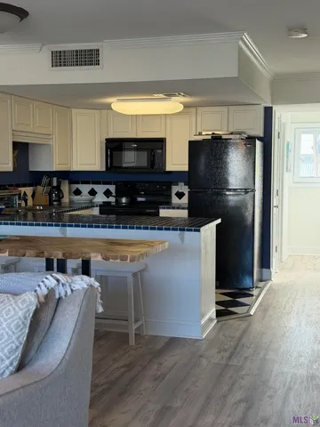 $229,500 | 411 Admiral Craik Drive, Unit 3, Grand Isle, LA 70358