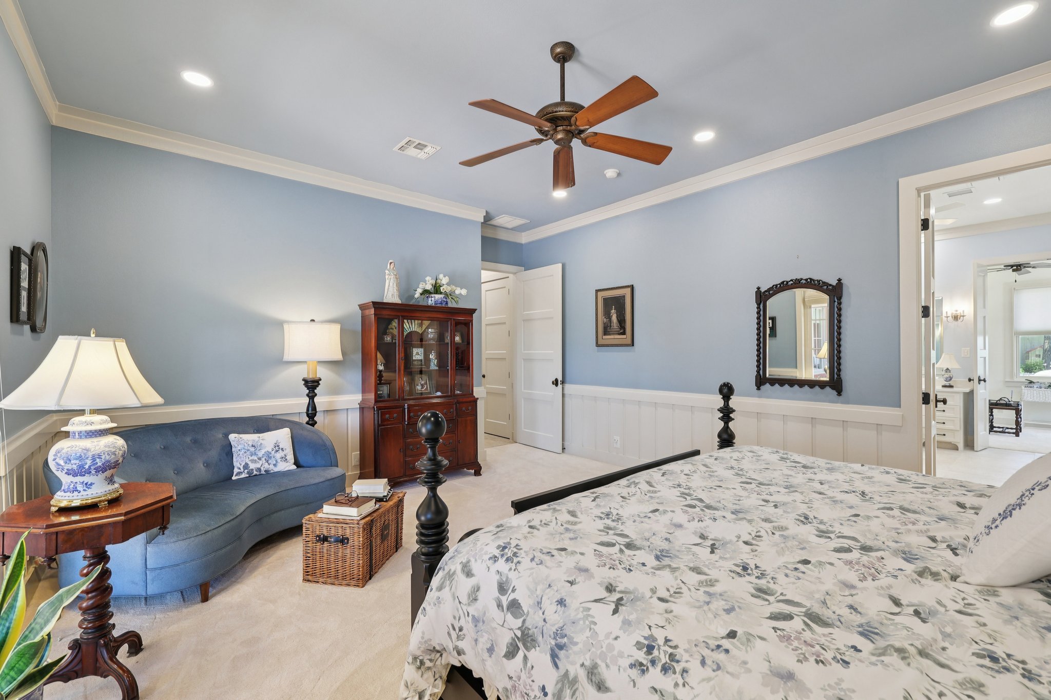 546 McAllister Road Bastrop, TX 78602 - Photo 21 of 40 Bedroom with a wainscoted wall, crown molding, recessed lighting, light colored carpet, and a ceiling fan