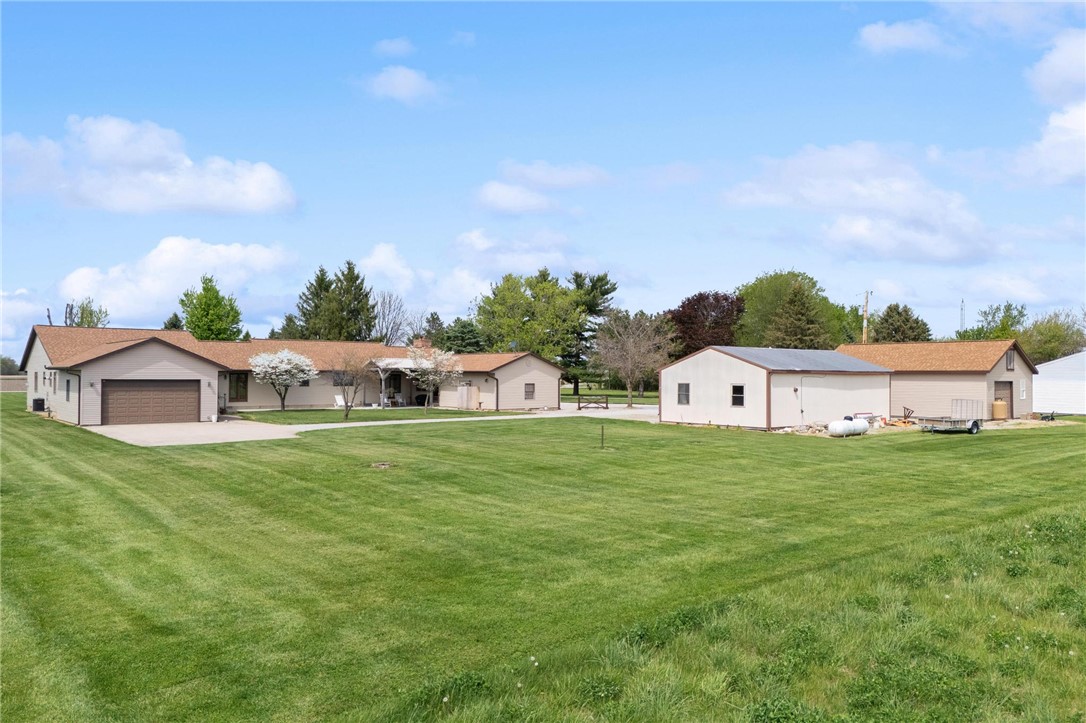 4971 Lackey Road Cedarville, OH 45314 - Photo 65 of 79 Expansive green grounds surround this charming ranch-style residence with ample outdoor storage.