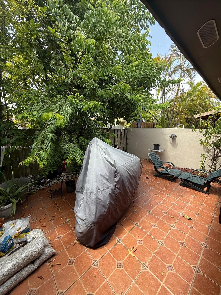 12246 Southwest 116th Lane Miami, FL 33186 - Photo 15 of 23 a view of a couches in a patio