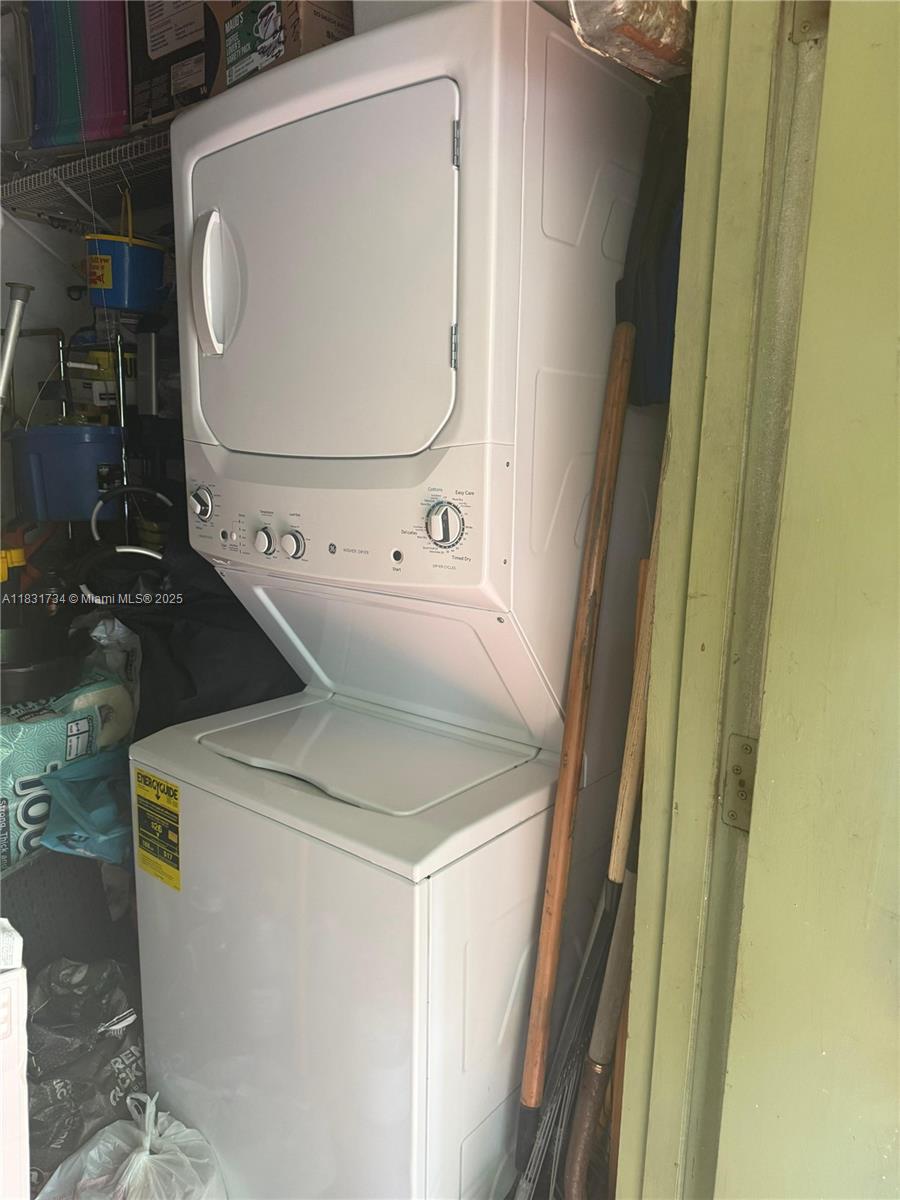 12246 Southwest 116th Lane Miami, FL 33186 - Photo 17 of 23 a utility room with dryer and washer