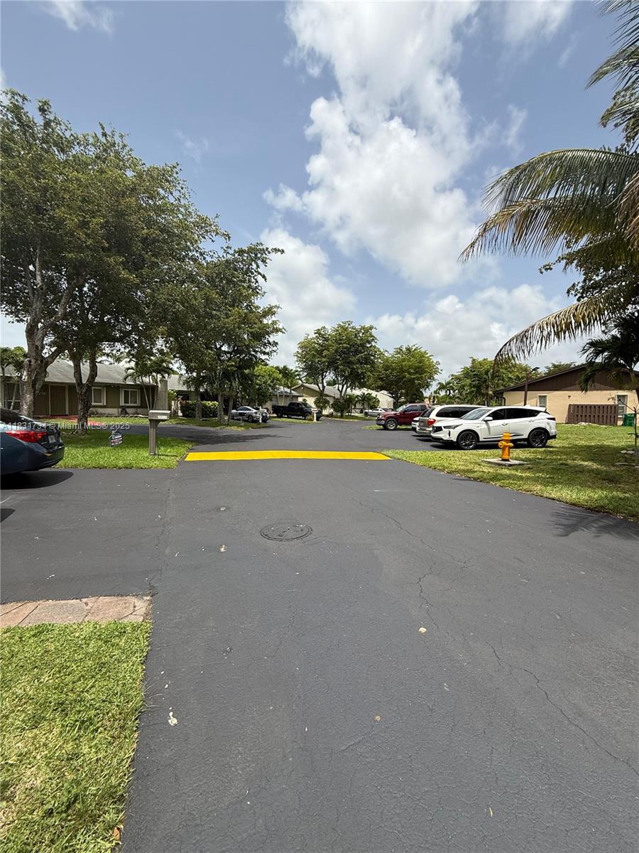 12246 Southwest 116th Lane Miami, FL 33186 - Photo 19 of 23 a view of a swimming pool and lake view