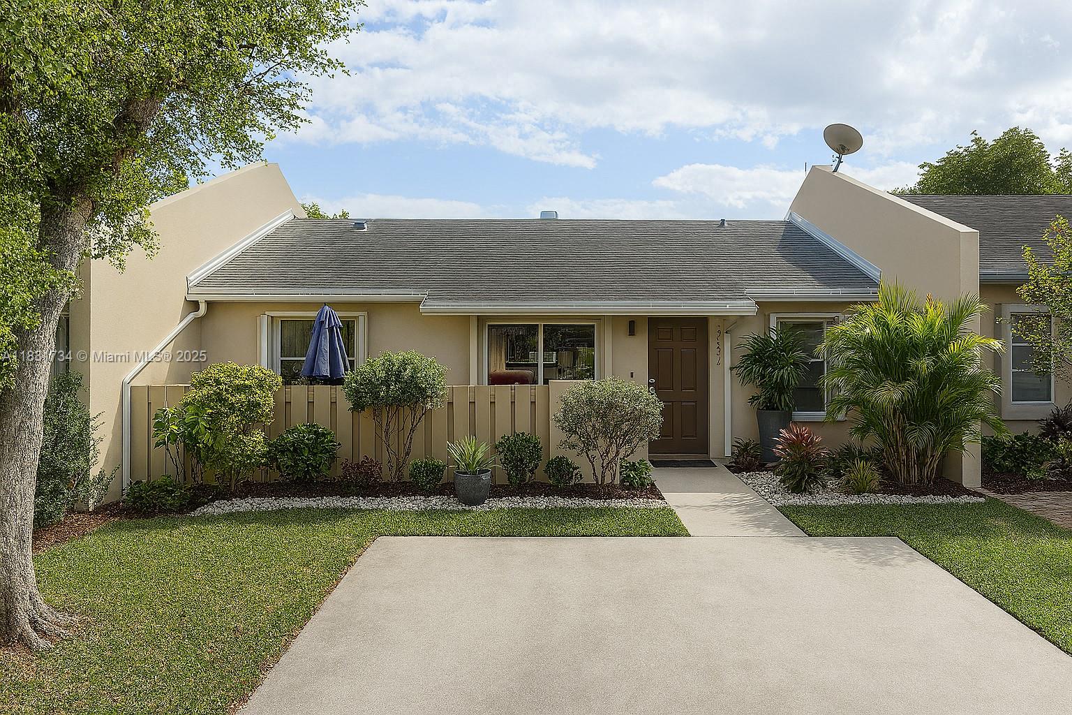12246 Southwest 116th Lane Miami, FL 33186 - Photo 20 of 23 front view of a house with a yard