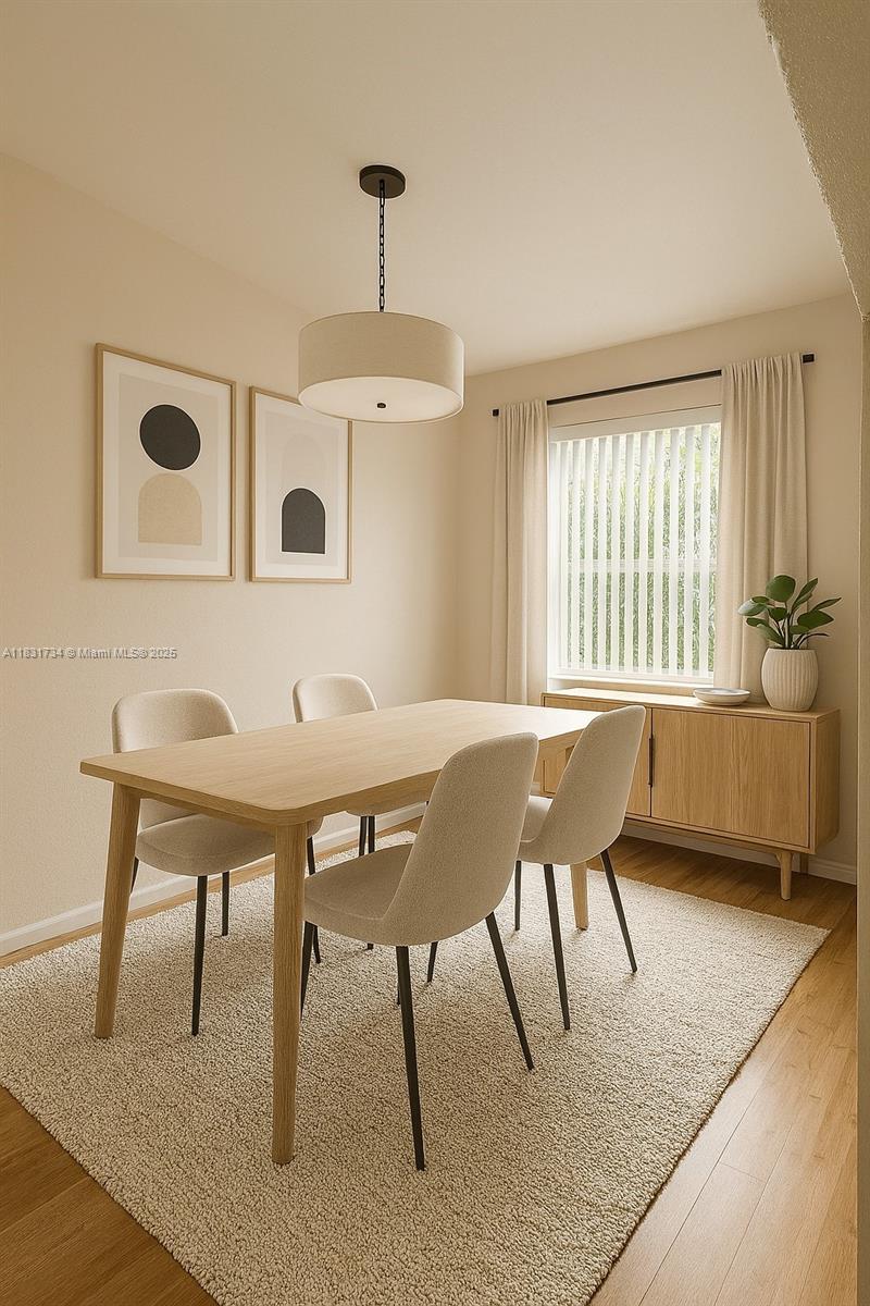 12246 Southwest 116th Lane Miami, FL 33186 - Photo 4 of 23 a view of a dining room with furniture
