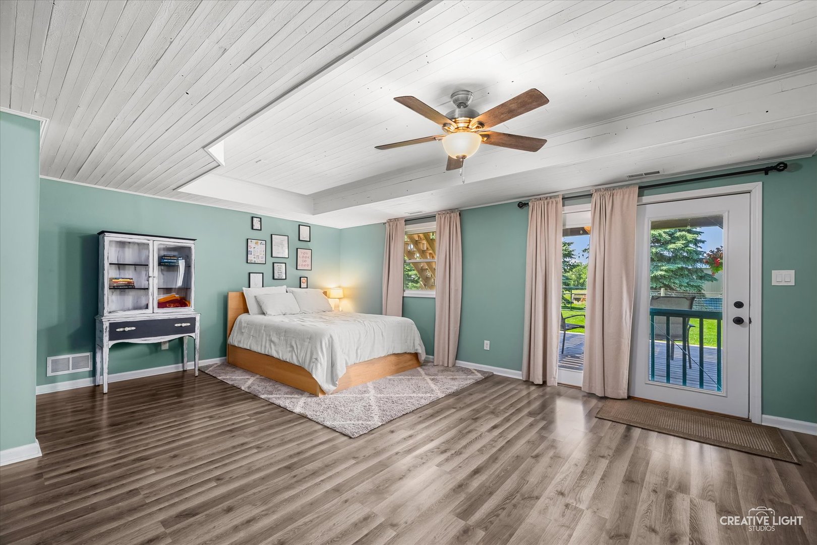 13495 Fennel Road Newark, IL 60541 - Photo 31 of 43 a spacious bedroom with a bed and a table in it