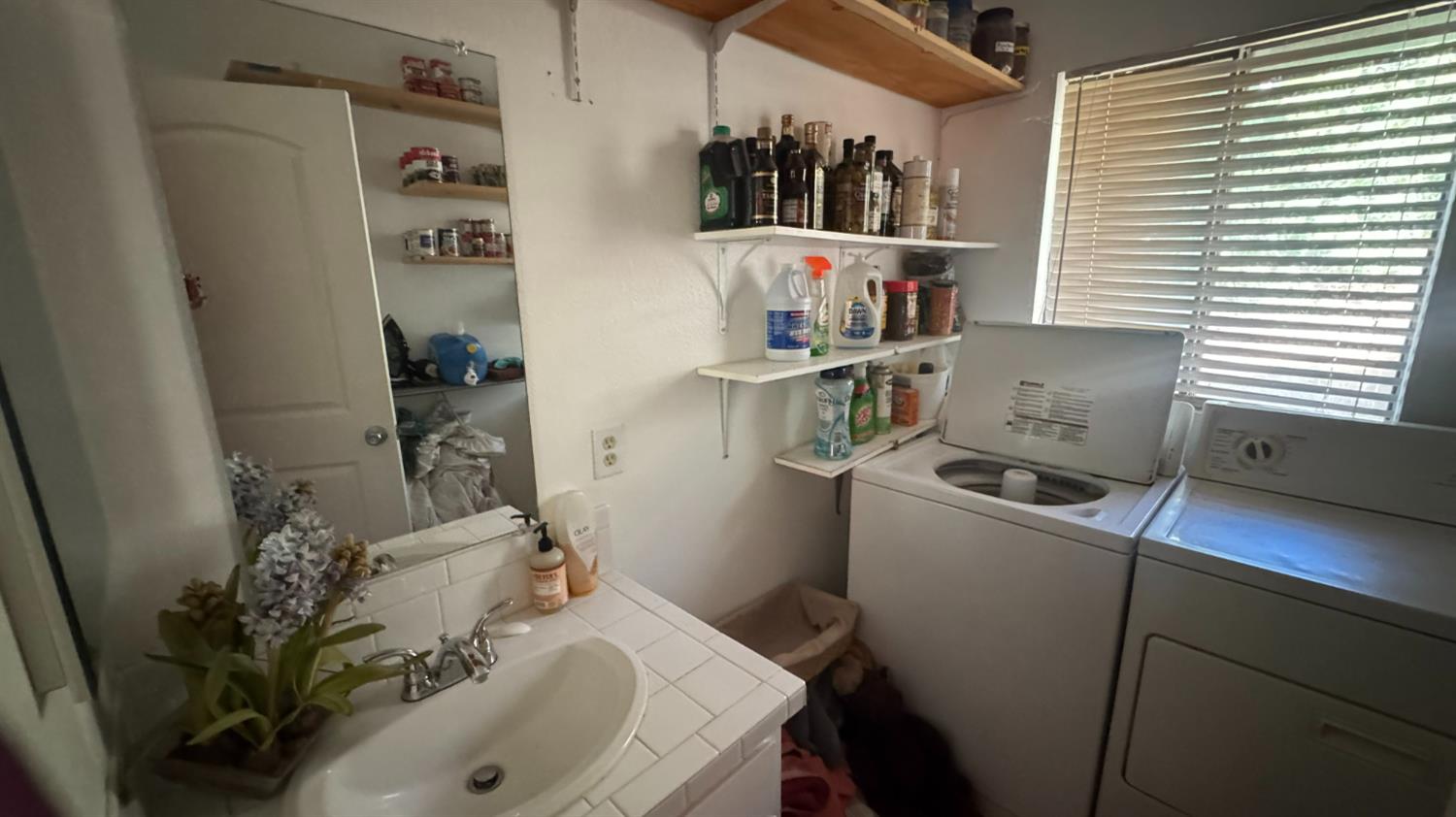 31160 Revis Road Coarsegold, CA 93614 - Photo 15 of 15 a room with storage and utility